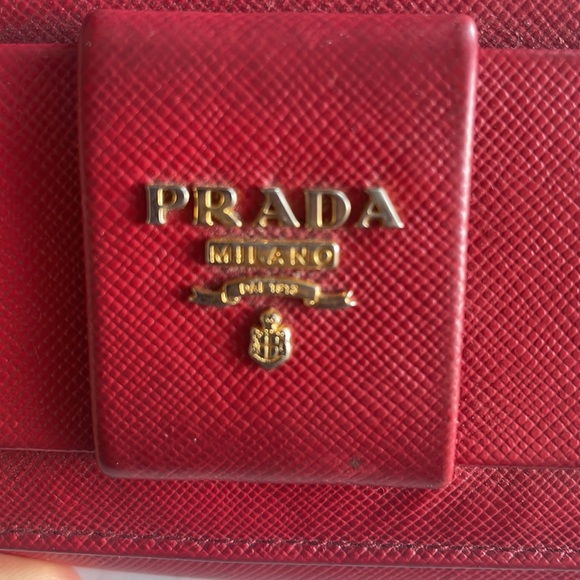 Prada Red Saffiano leather wallet with a bow accent. - Picture 2 of 5